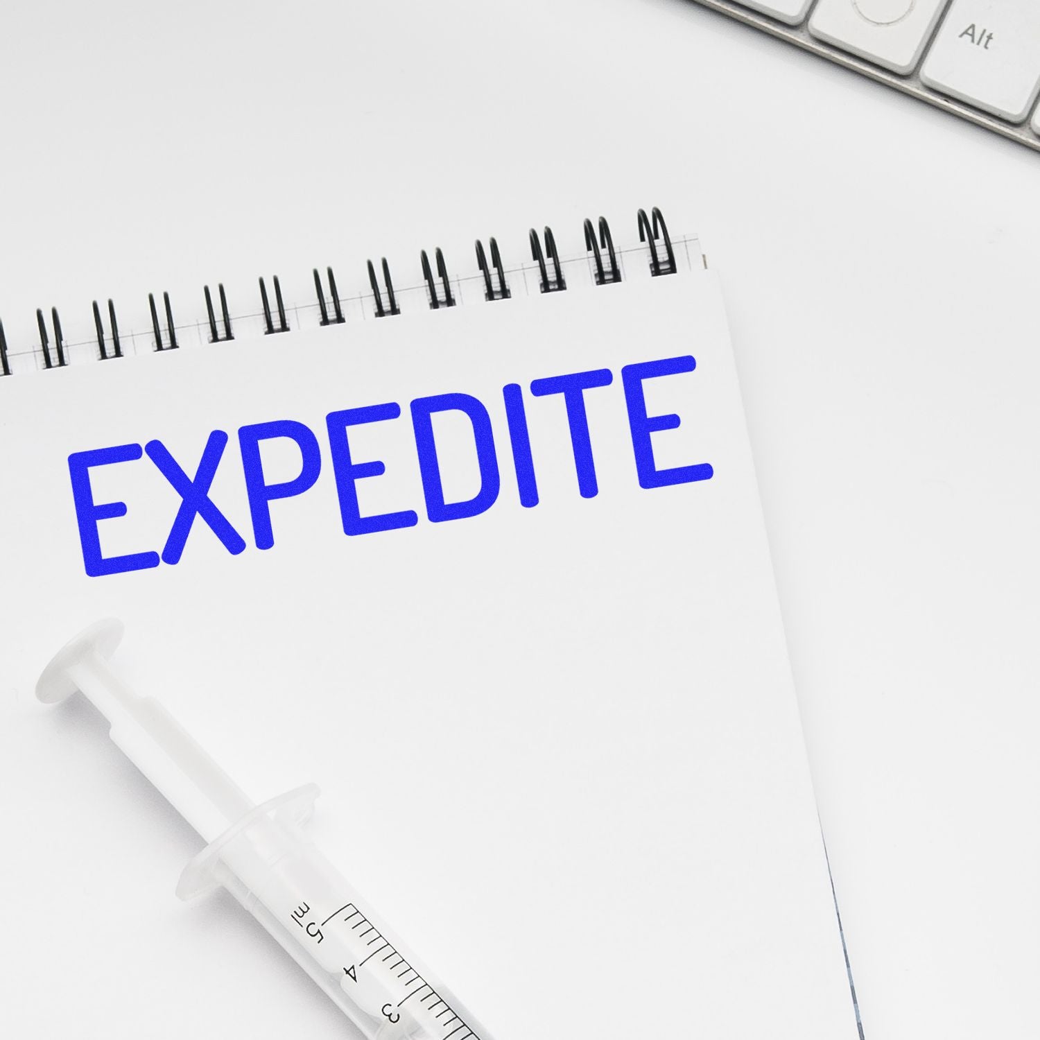 Medical syringe beside a document reading EXPEDITE, symbolizing fast healthcare processing.