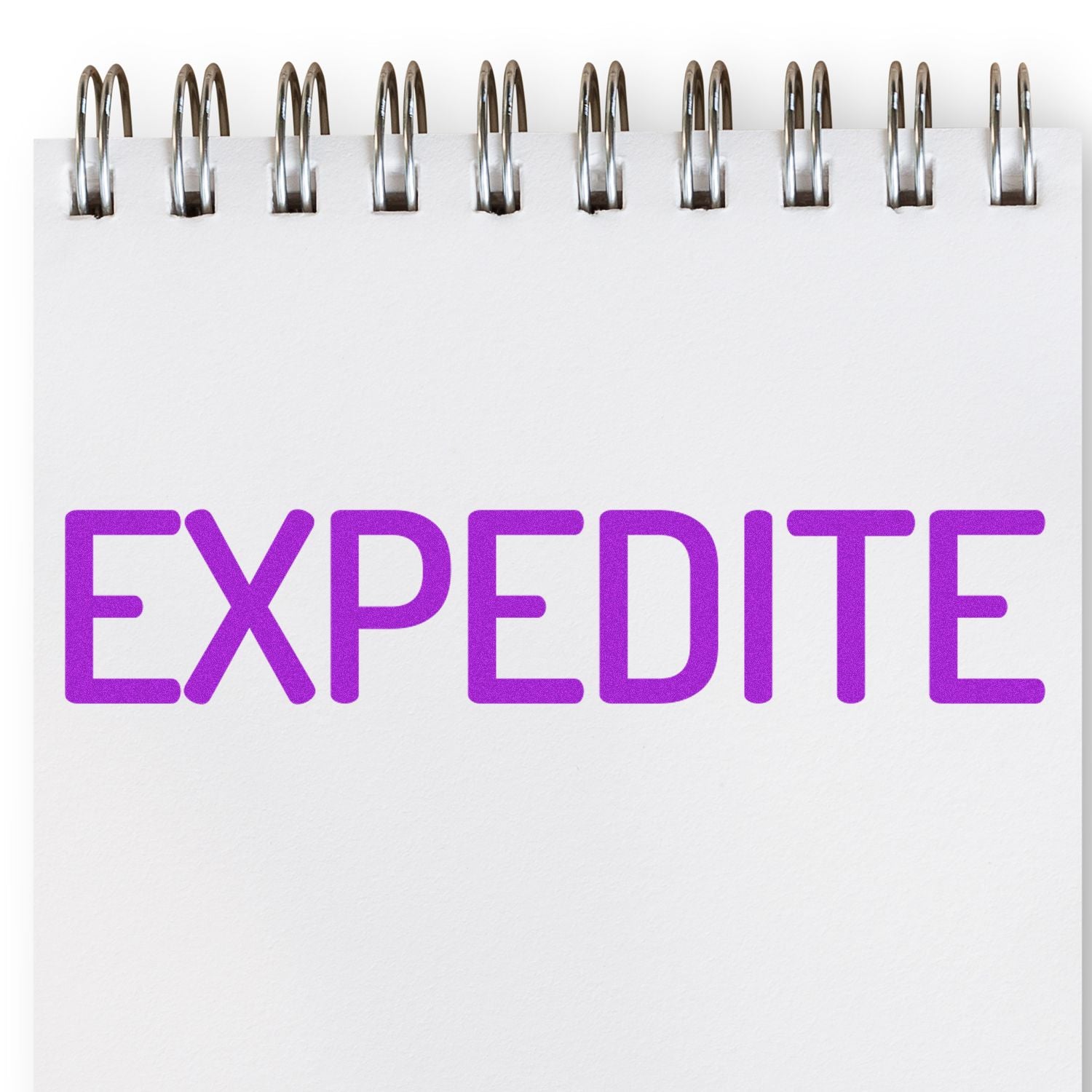 Whiteboard sign reading EXPEDITE with metal binder clips, highlighting fast shipping and quick service