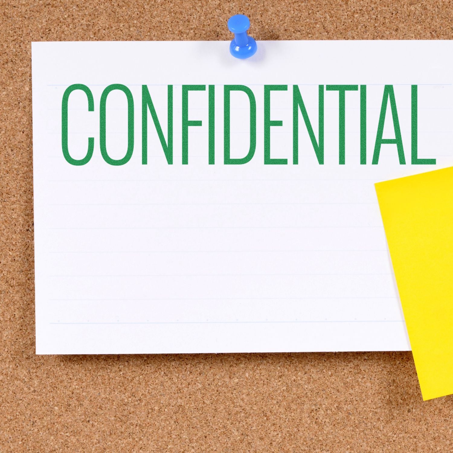 Confidential document pinned to a cork board with a blue pushpin and yellow sticky note.