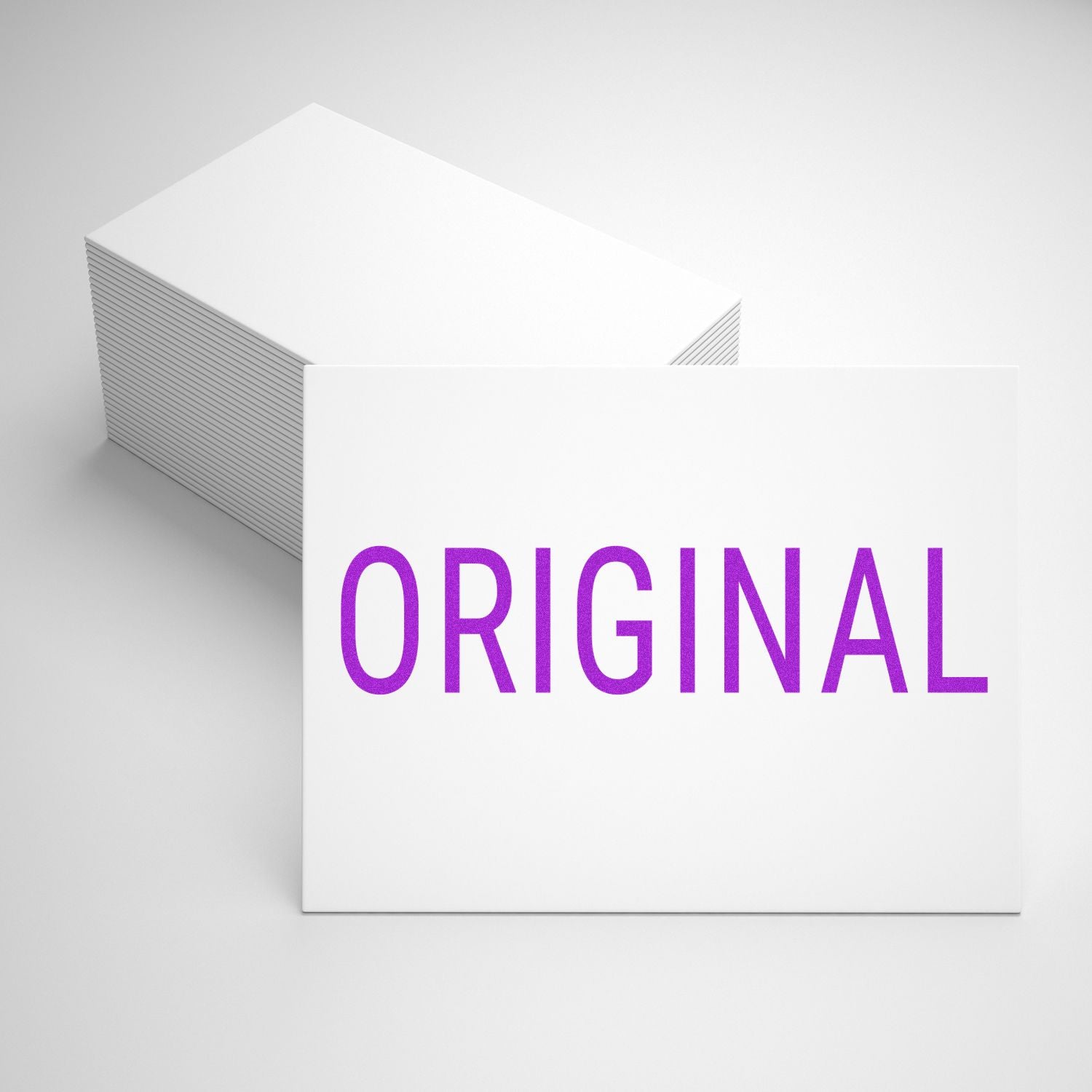 Stack of white business cards with ORIGINAL in purple text, minimalist branding mockup on a clean white background.