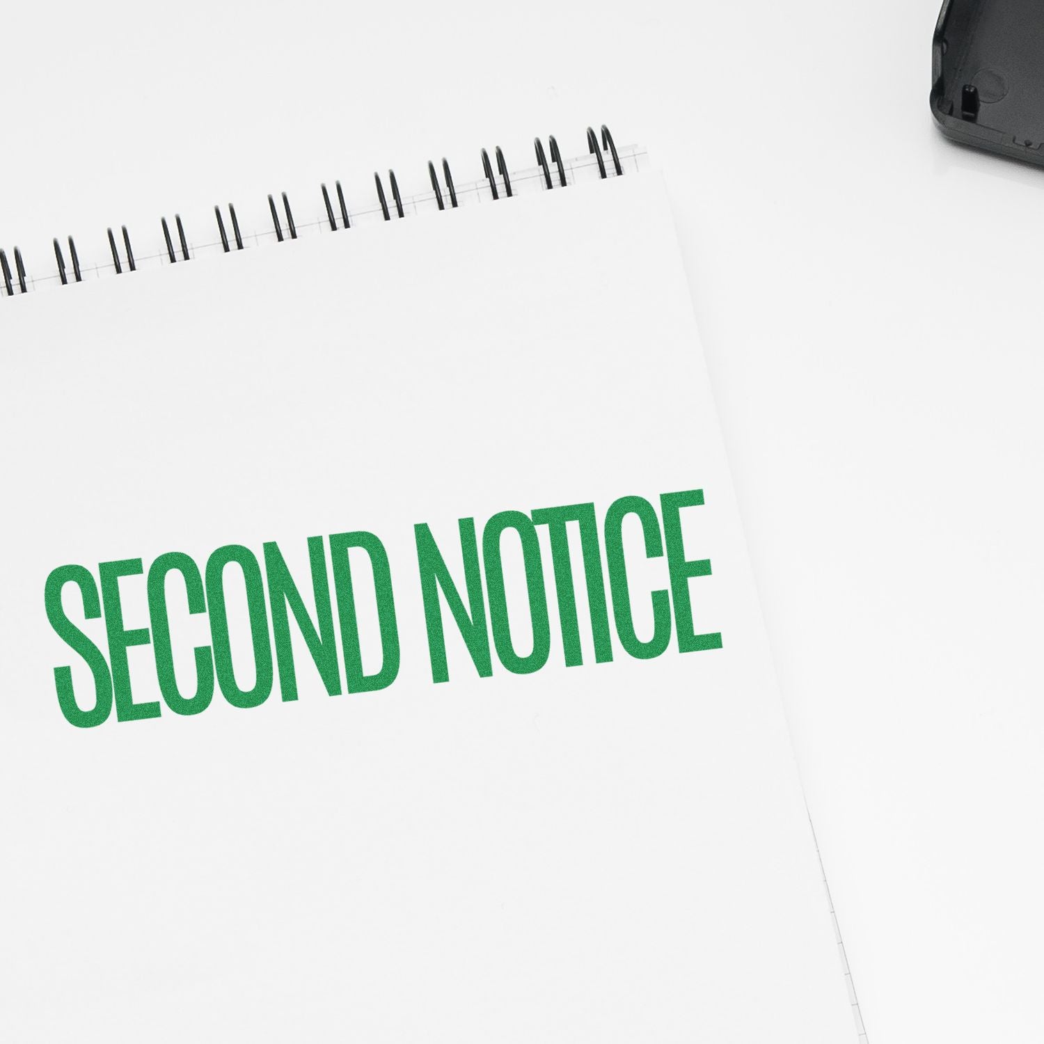 Security notice document reading SECOND NOTICE with binder rings, used for follow-up reminders and billing escalation.