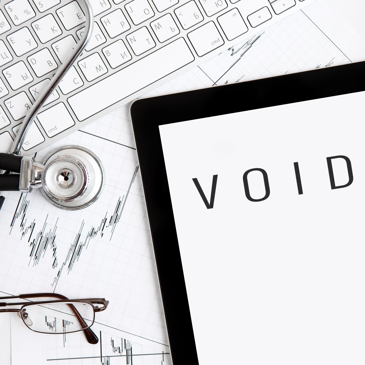 Healthcare claims and data analysis concept with stethoscope, stock charts, and VOID document indicating rejected medical billing