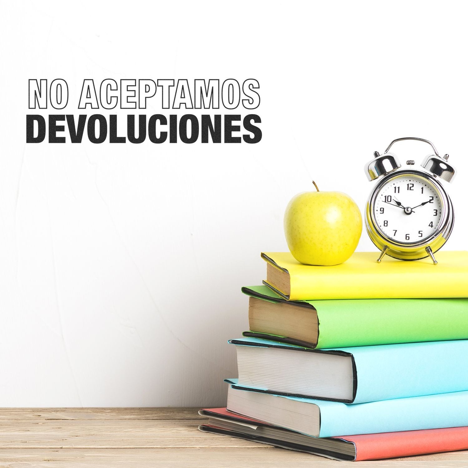 Texto No aceptamos devoluciones sobre libros con reloj y manzana, sealando poltica de no devoluciones y compras sin reembolso.