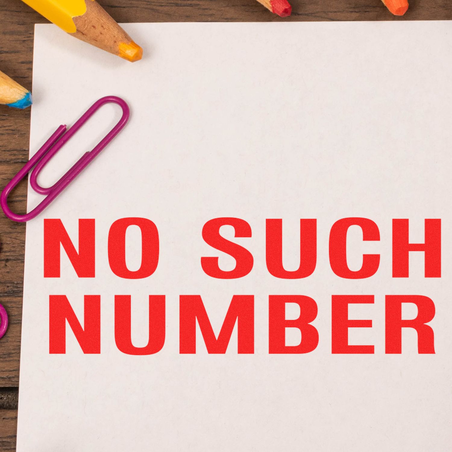 No such number error message on paper with colored pencils and a paperclip, illustrating numeric input troubleshooting for forms and databases.