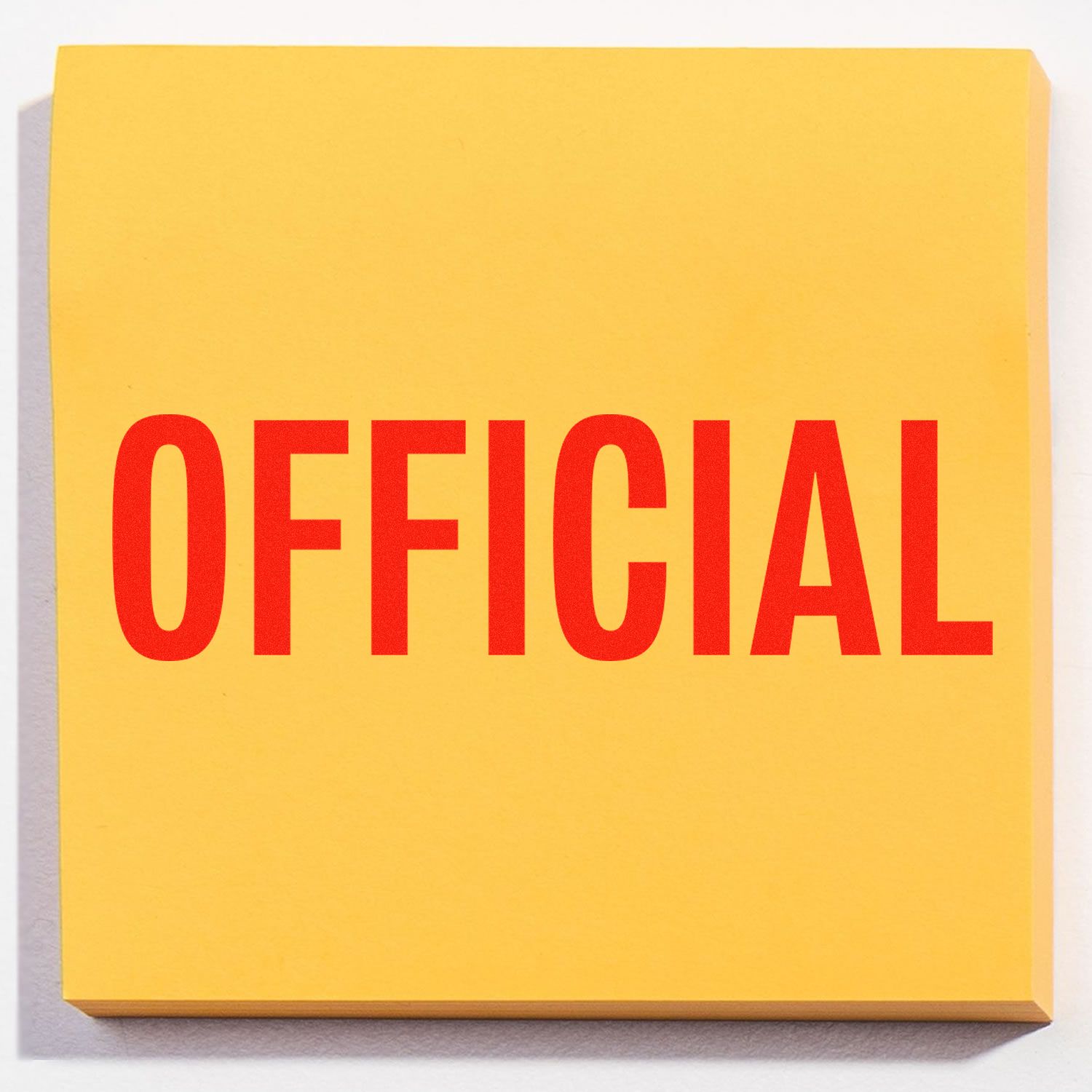 Yellow office note pad with OFFICIAL in bold red letters on a yellow background