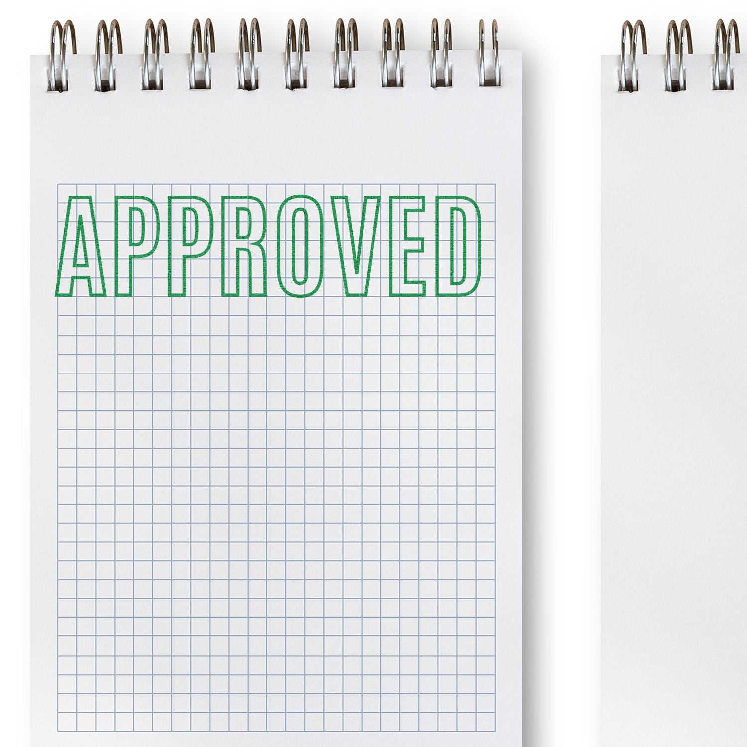 Notebook graph-paper page with APPROVED title, suggesting a work approval checklist or document status label for printing and design mockups.