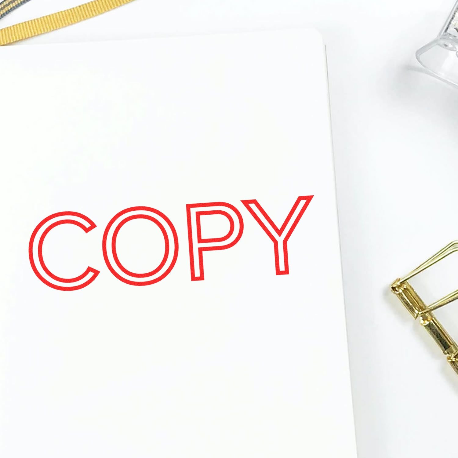 COPY marketing stationery card with bold red COPY text and gold pen, symbolizing copywriting and content creation tools.