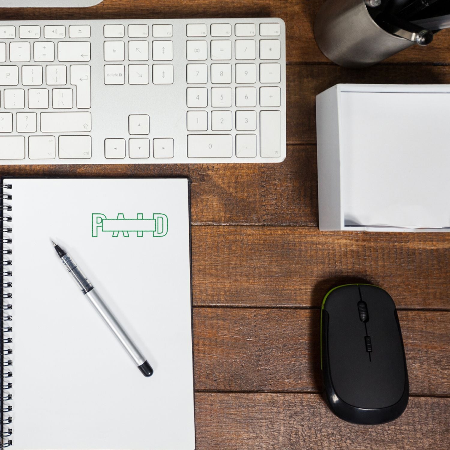 Desktop work setup with keyboard, mouse, and notebookillustration of office productivity, typing, and note taking at a computer