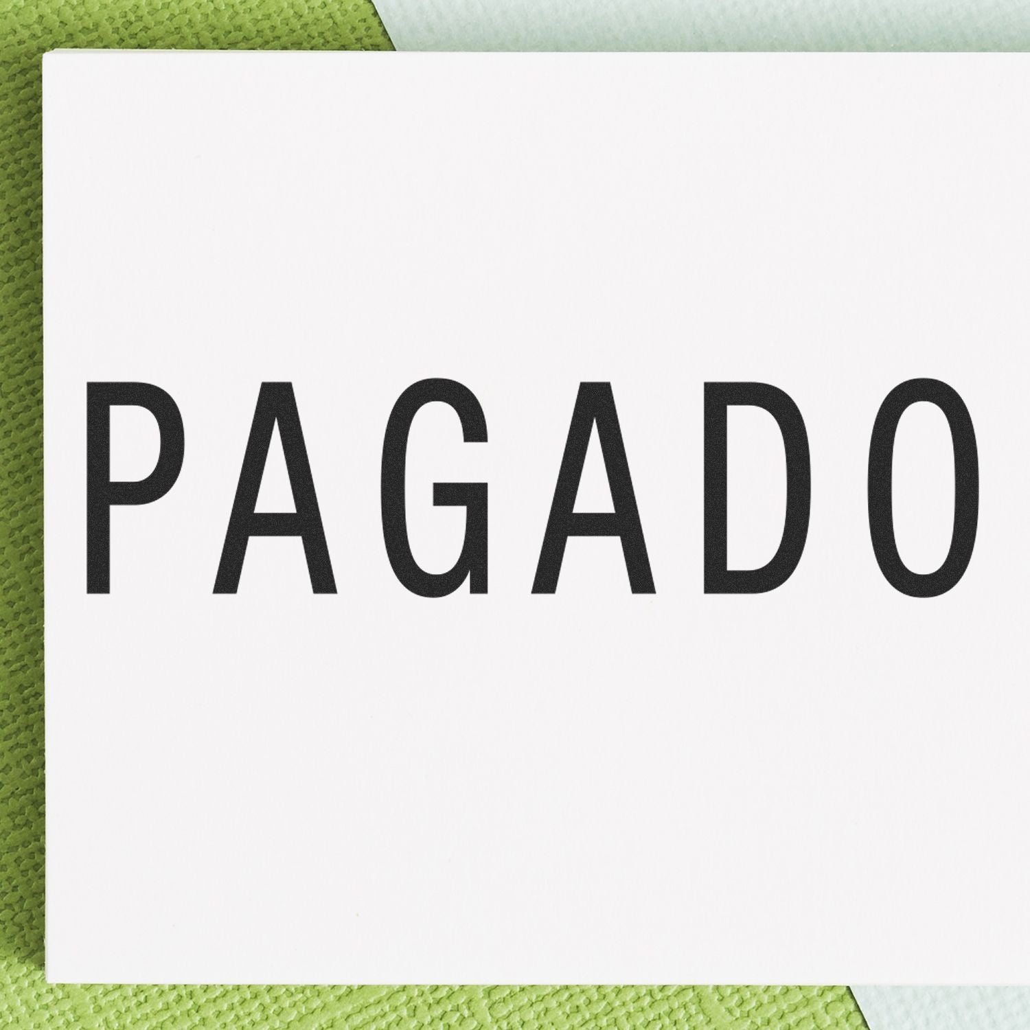 PAGADO label in bold black letters on a white card, indicating a paid payment status on green textured background.