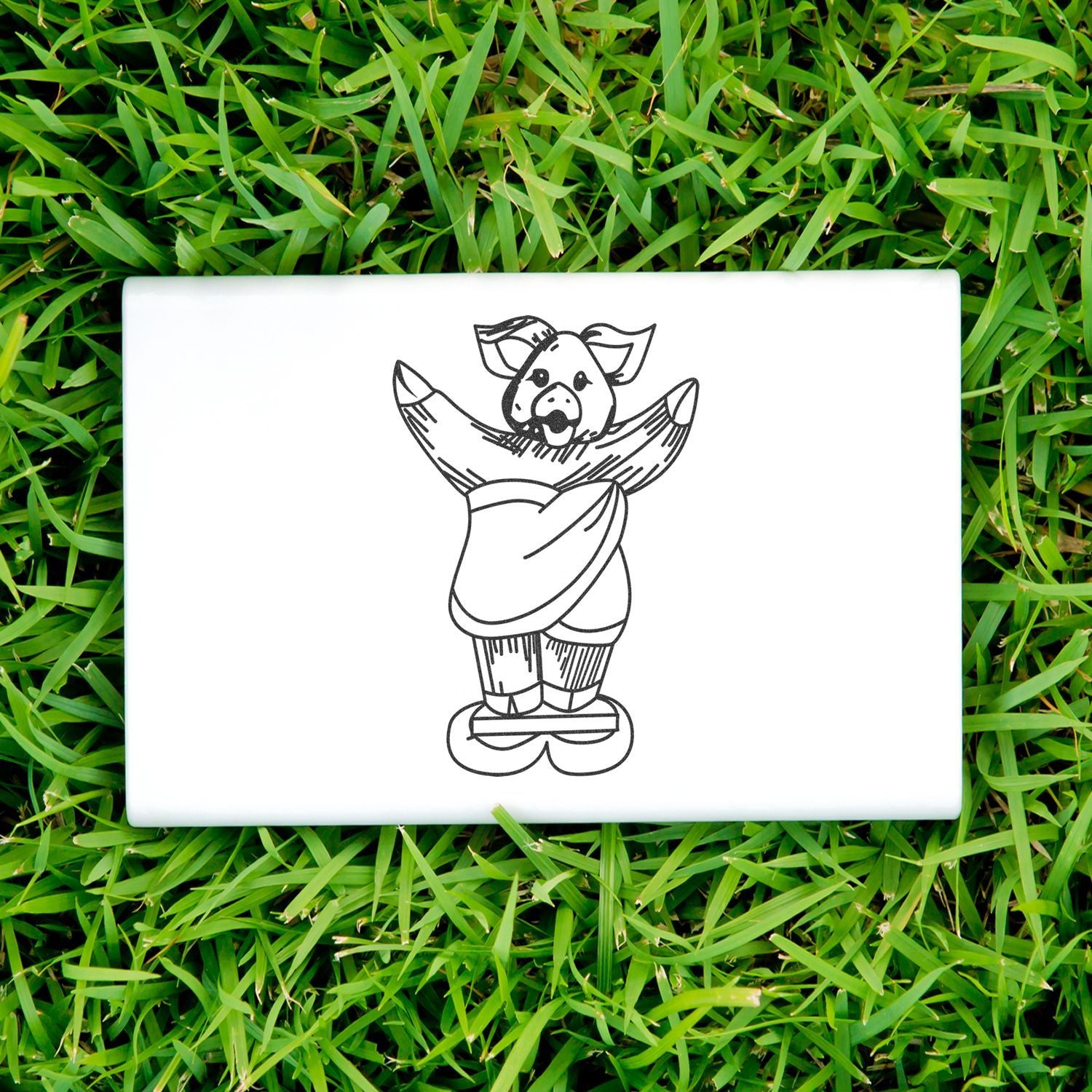 White tile with cute pig line art on green grass background