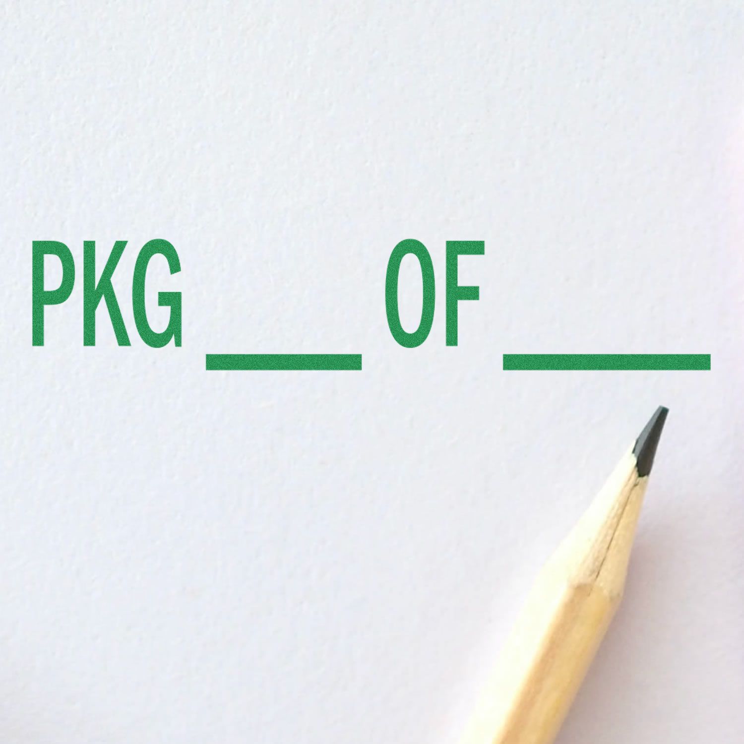 Close-up of pencil on white paper with green PKG OF text and blank lines, package label template design.