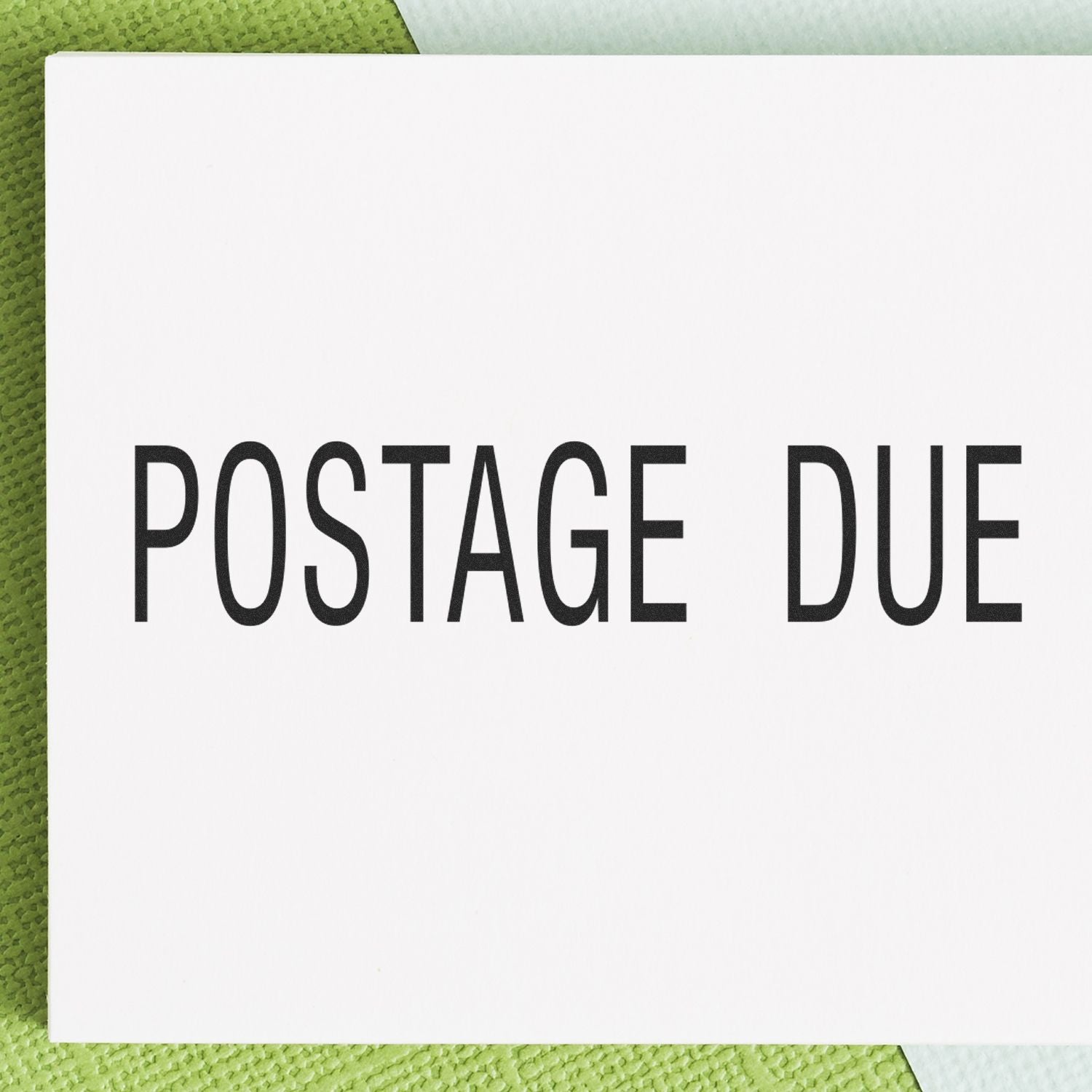 Postage due notice with POSTAGE DUE text on mailing card, indicating extra postage required for shipping for letters and packages.