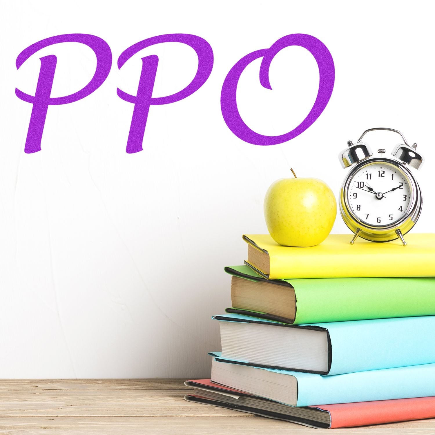 PPO letters with stacked books, apple, and alarm clock on a desk, concept of education and time management