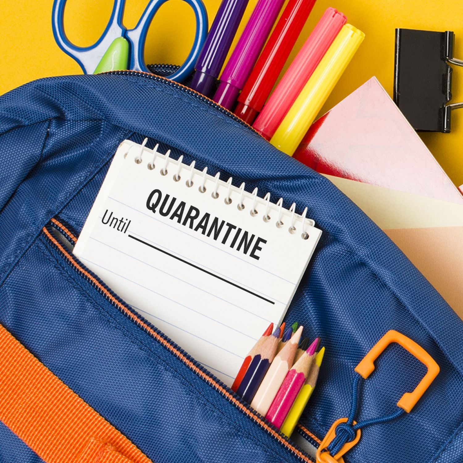 Blue school pencil case with QUARANTINE notebook, colorful pencils and markers for at-home learning