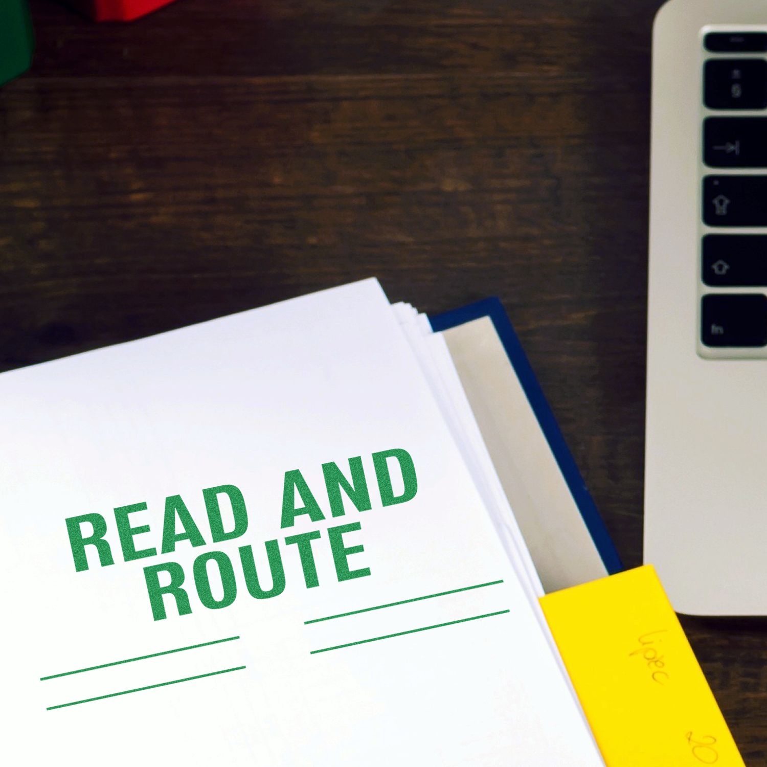 Worksheet titled READ AND ROUTE with yellow pencil and smartphone on desk, supporting learning, reading, and study planning