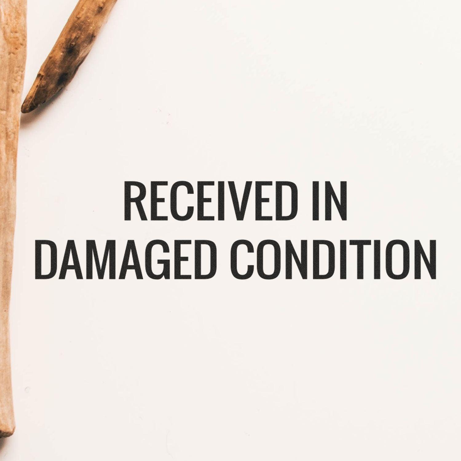 Received in damaged condition warning text on a damaged wooden package background.