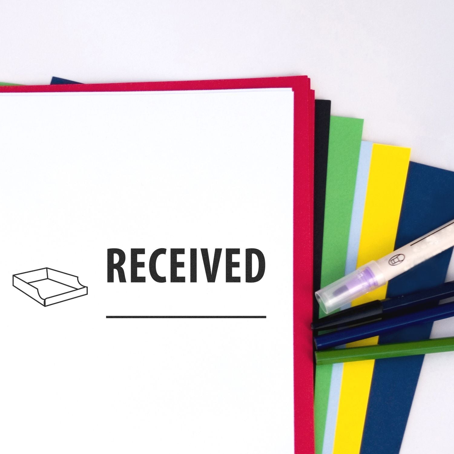 Received office folder with colorful paperwork, pens, and stationery for document organization