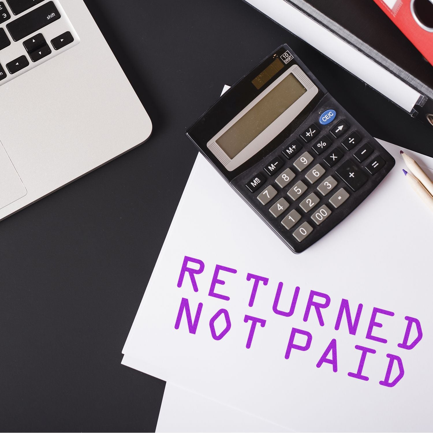Calculator beside an invoice marked RETURNED NOT PAID, showing late payment status and accounting finance documentation for tax.
