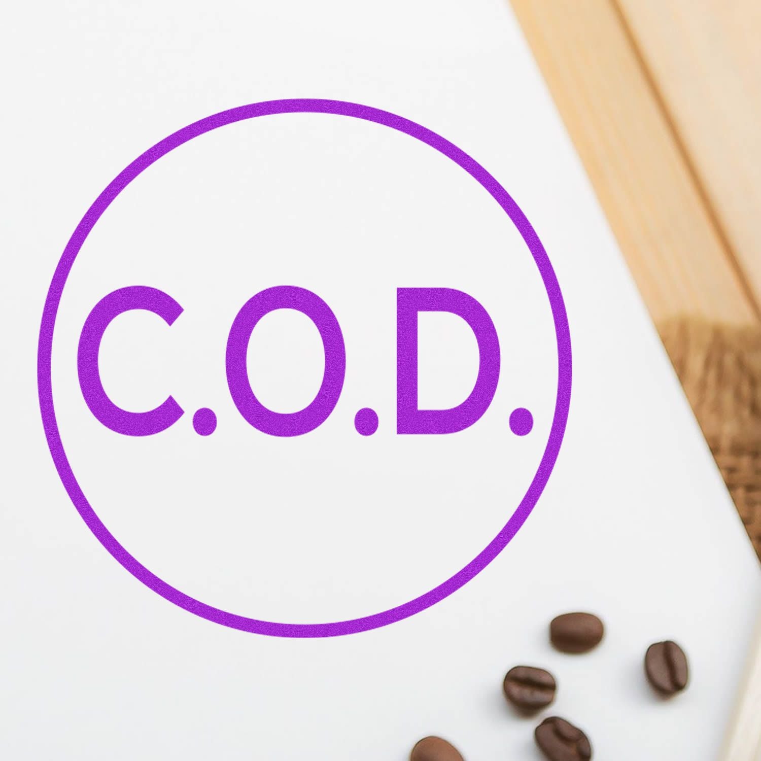 Purple C.O.D. coffee logo with coffee beans on a white background.