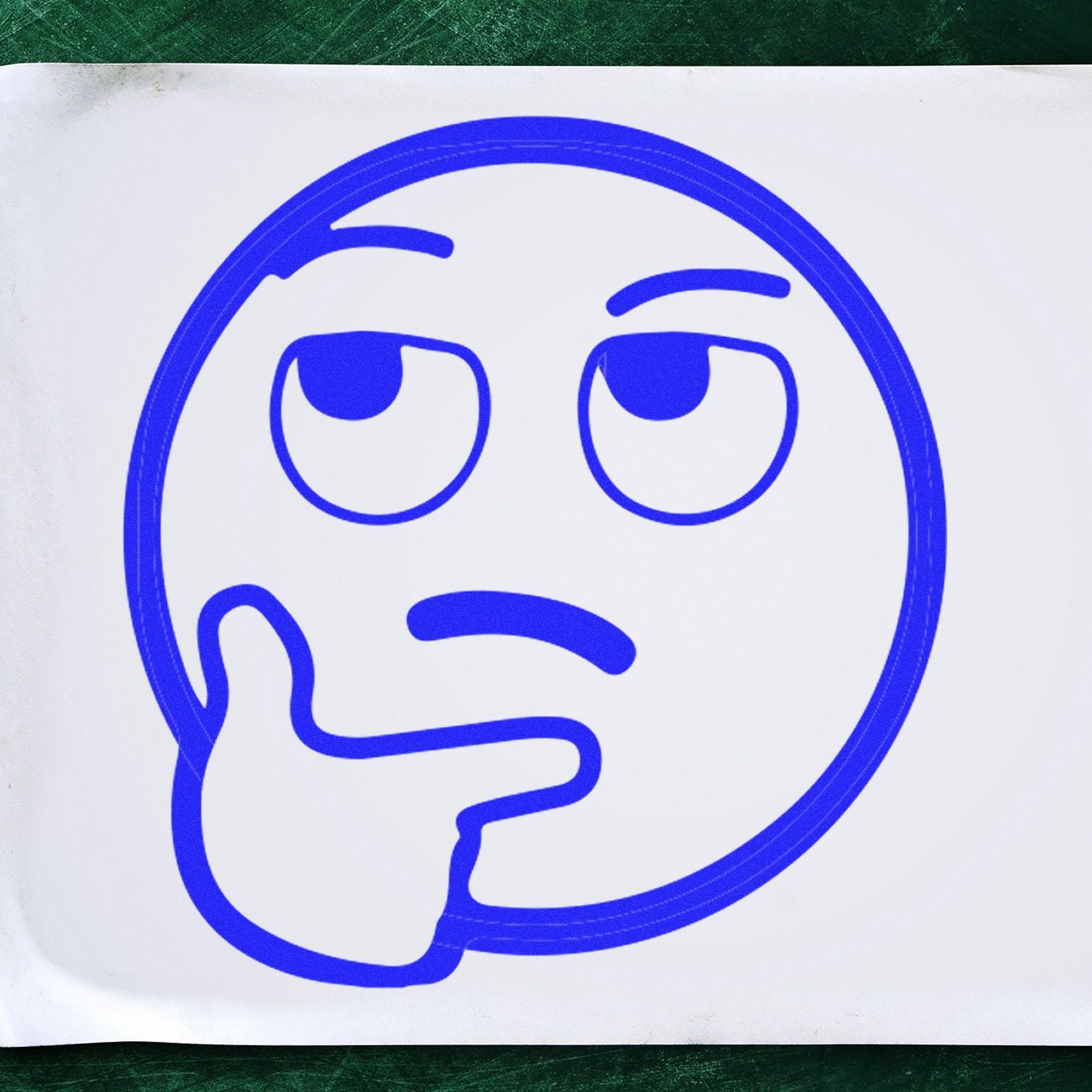 Blue hand-drawn thinking face emoji sketch on white paper, simple minimalist expression icon.