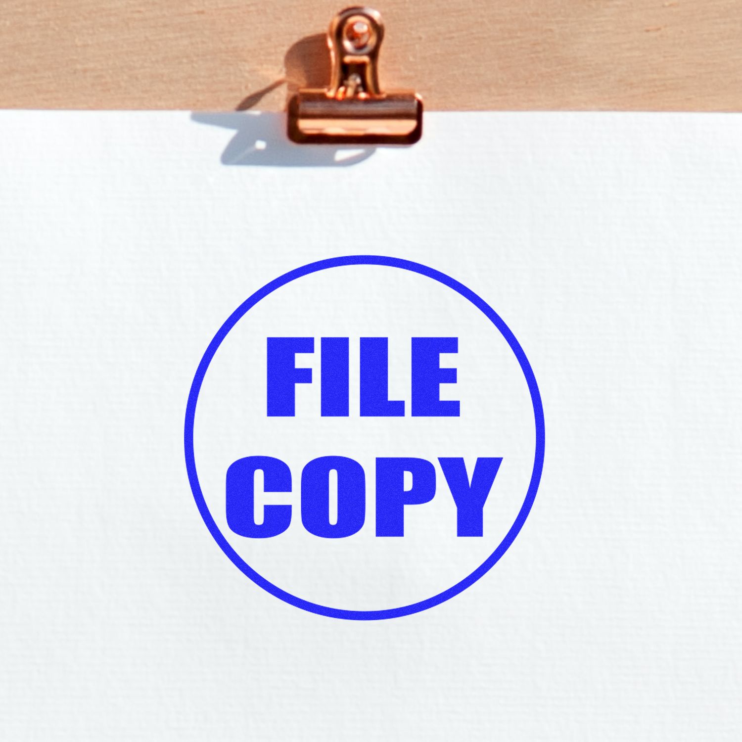 Clipboard with paper labeled FILE COPY in blue text, office document copy notice.