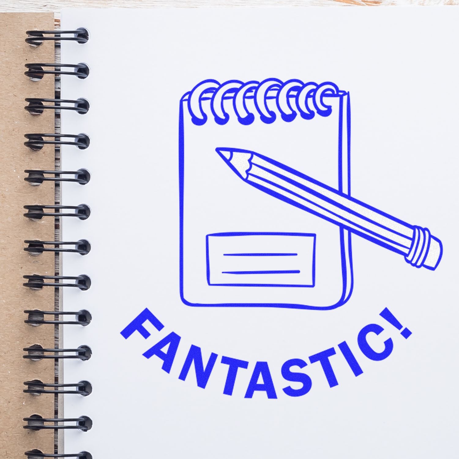 Blue Fantastic notebook illustration with pencil on spiral-bound notepad, creative stationery concept.