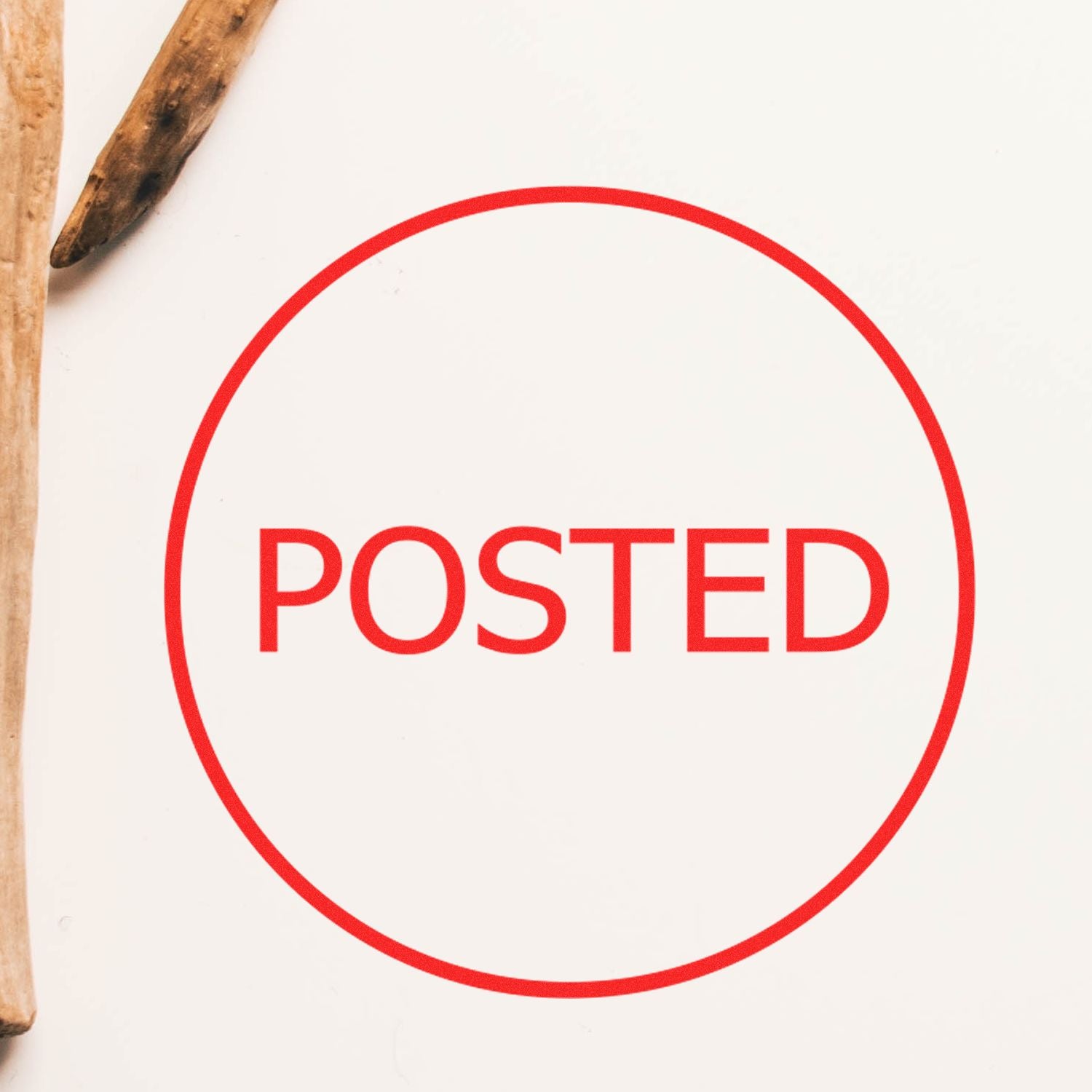 Red POSTED stamp in a circle on white paper, signifying mailed, approved, or completed document status.