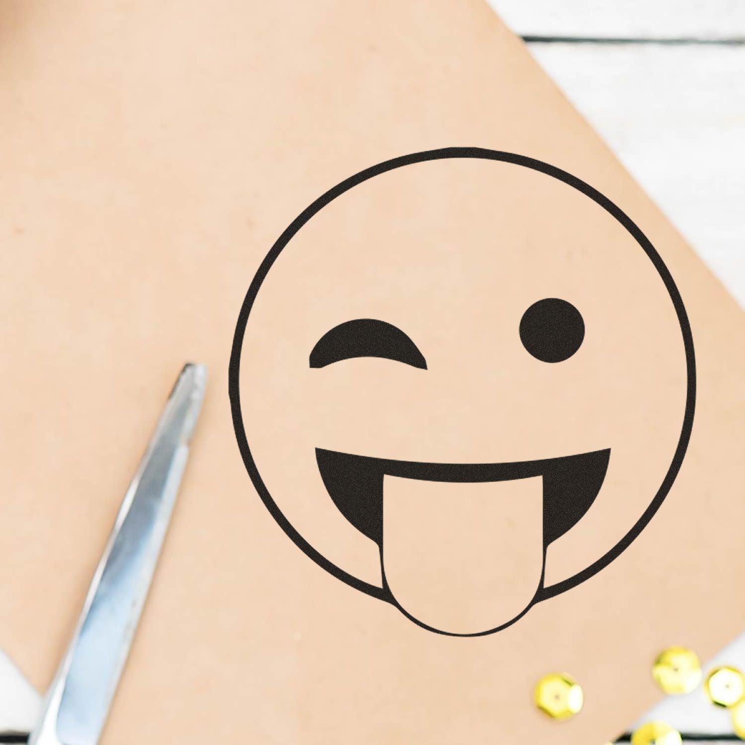 Close-up of skin with winking tongue-out emoji overlay and tweezers, suggesting skincare or hair removal treatment.