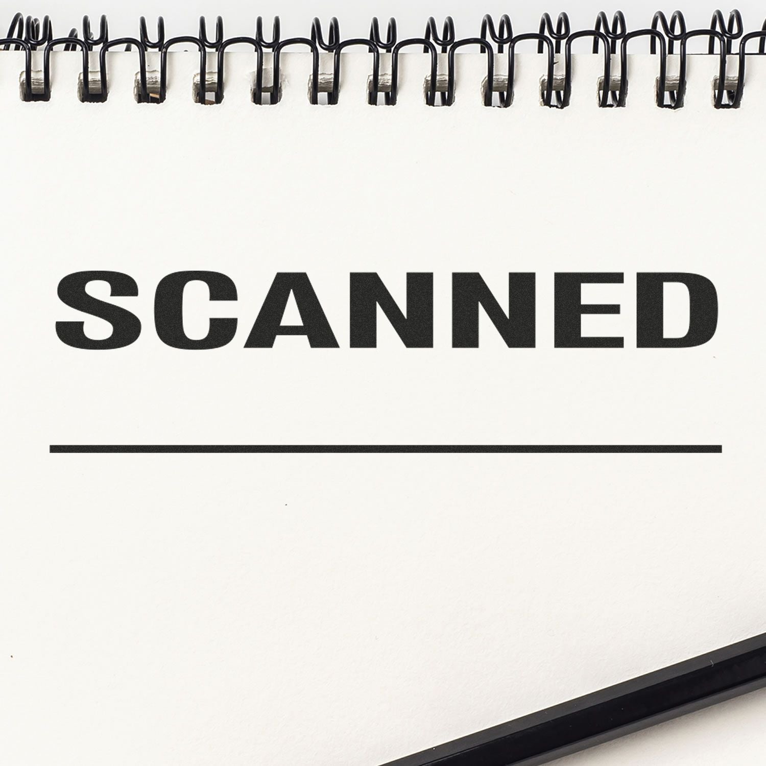 Scanned document label with binder clips, showing SCANNED text for organizing and digitizing paperwork.
