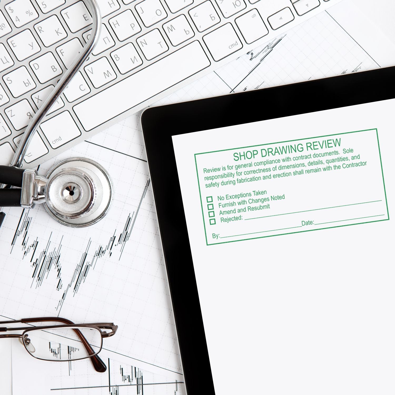 Tablet displaying shop drawing review form on blueprint with stethoscope, keyboard, glasses, and financial chart background