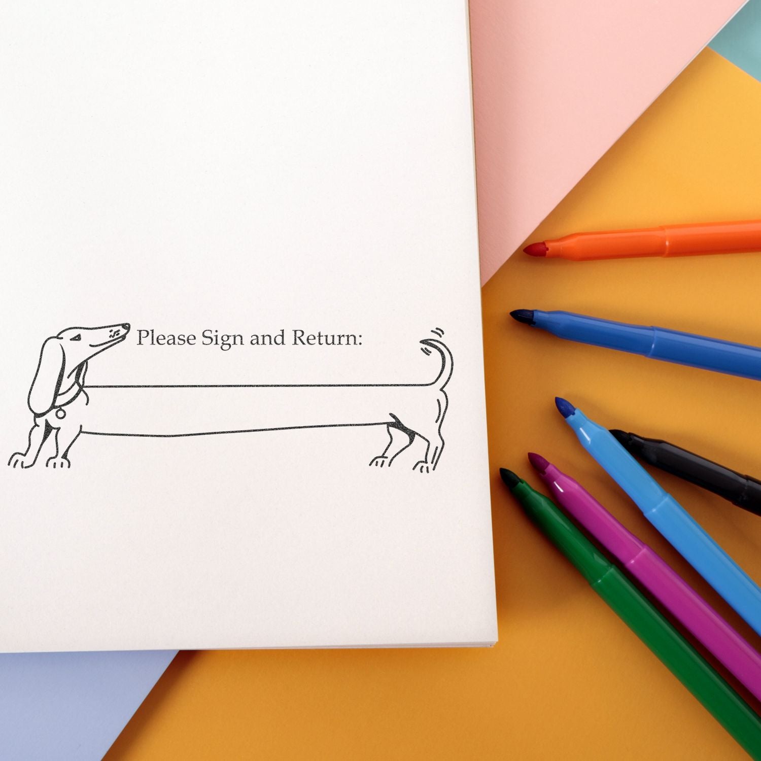 Colorful markers beside a Please Sign and Return note with dachshund illustration on pastel stationery.