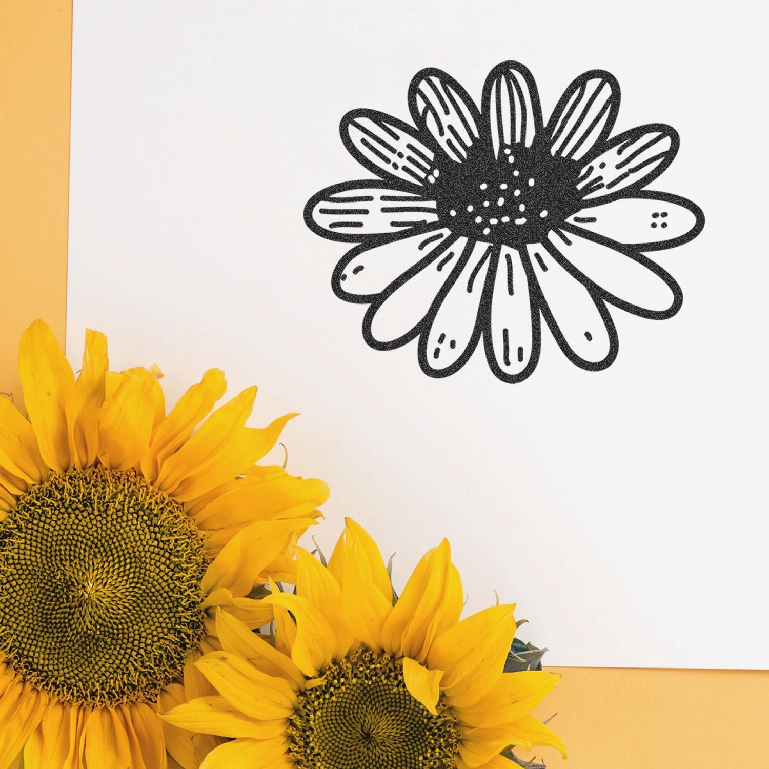Bright yellow sunflowers with a black floral line art illustration on a white background.