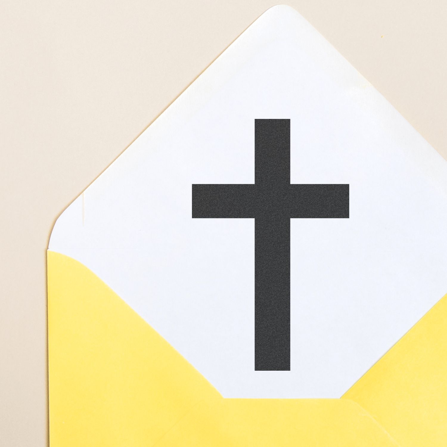 White envelope with a black cross symbol and yellow corner accents on a beige background.