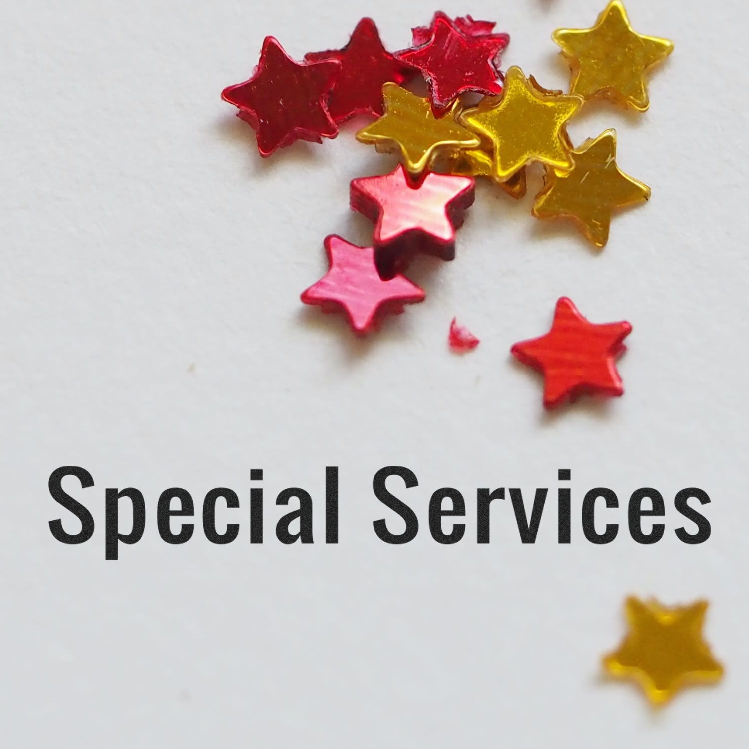 Colorful red and gold star confetti with Special Services text on a white background.