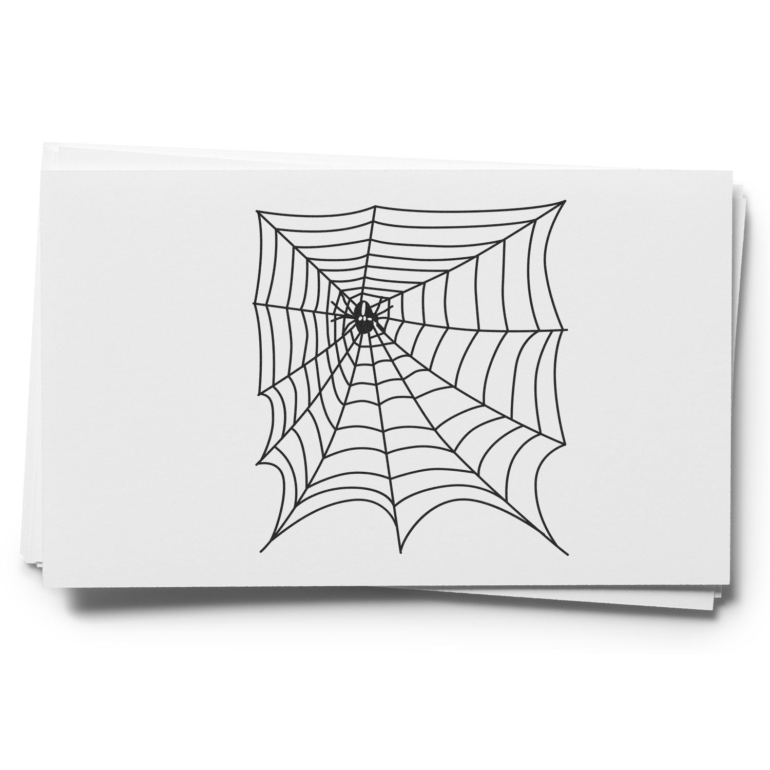 Black spider web illustration on stacked white paper, simple Halloween-themed line art design.