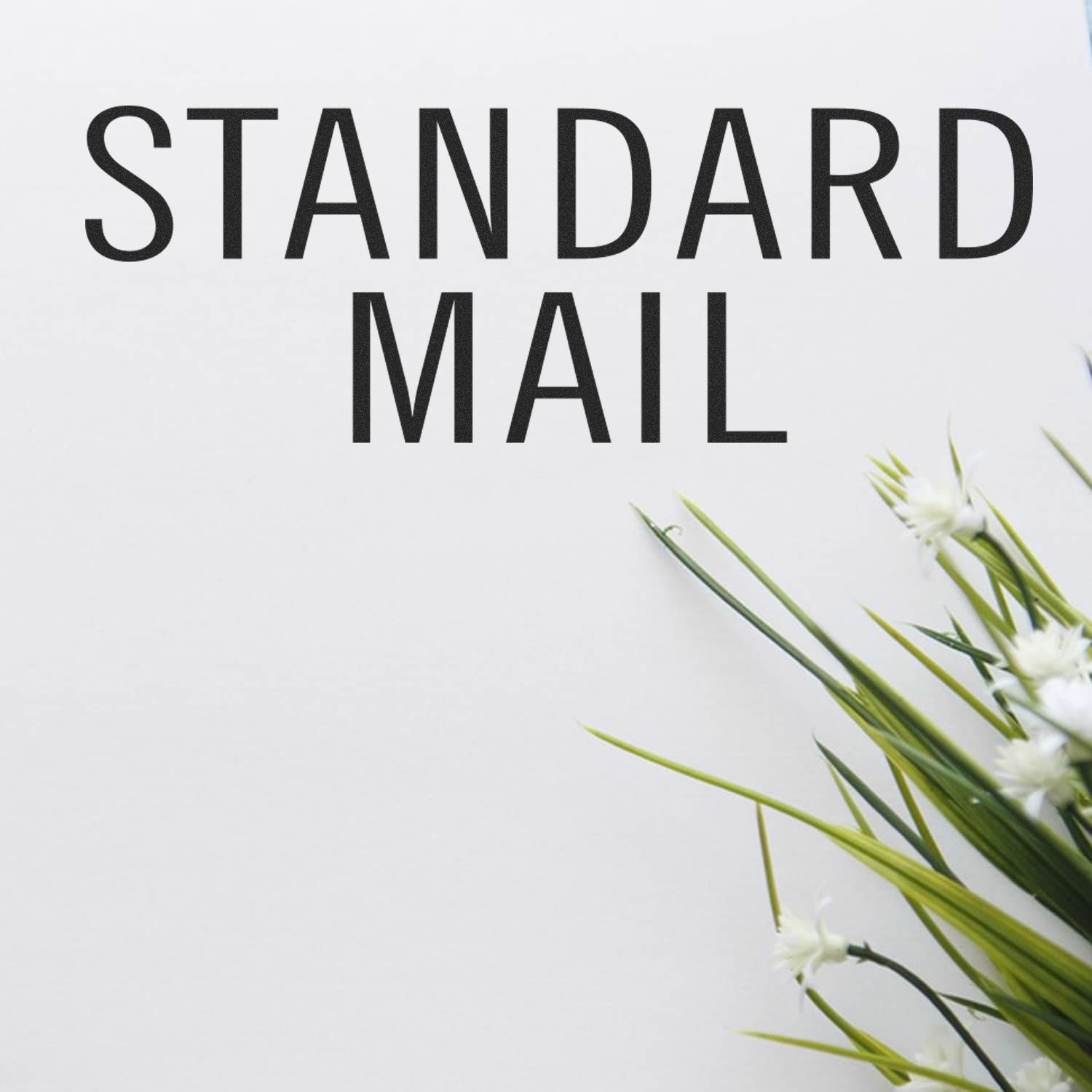 Standard mail marketing banner with STANDARD MAIL text and white flowers on a clean background.