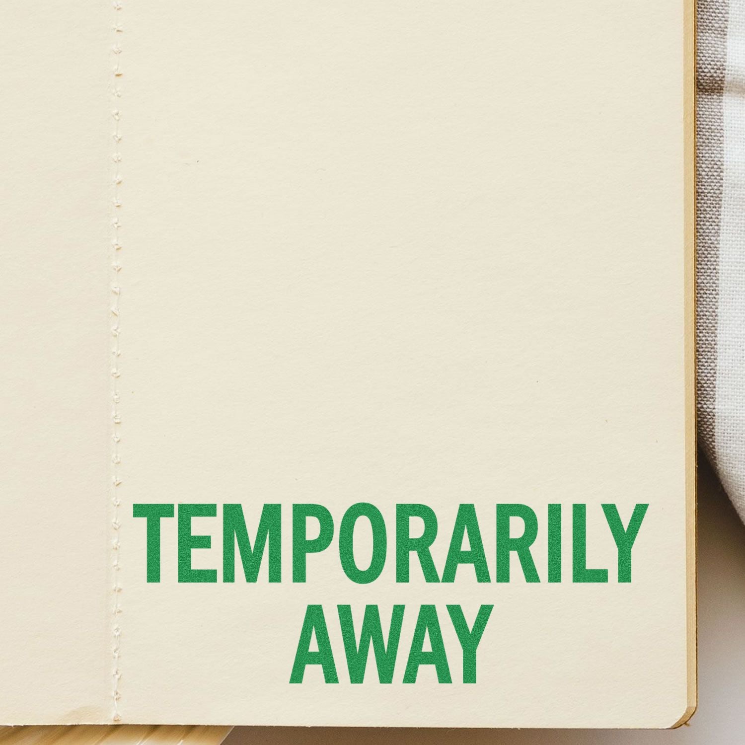 Beige book cover with green title Temporary Away, minimalist typography highlighting a literature or retreat story theme.