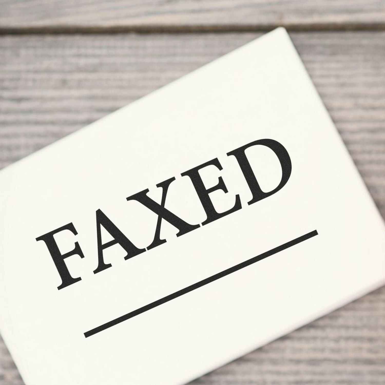 Close-up of 'FAILED' text on a white page, conveying a motivational message about overcoming failure in inspirational branding design.
