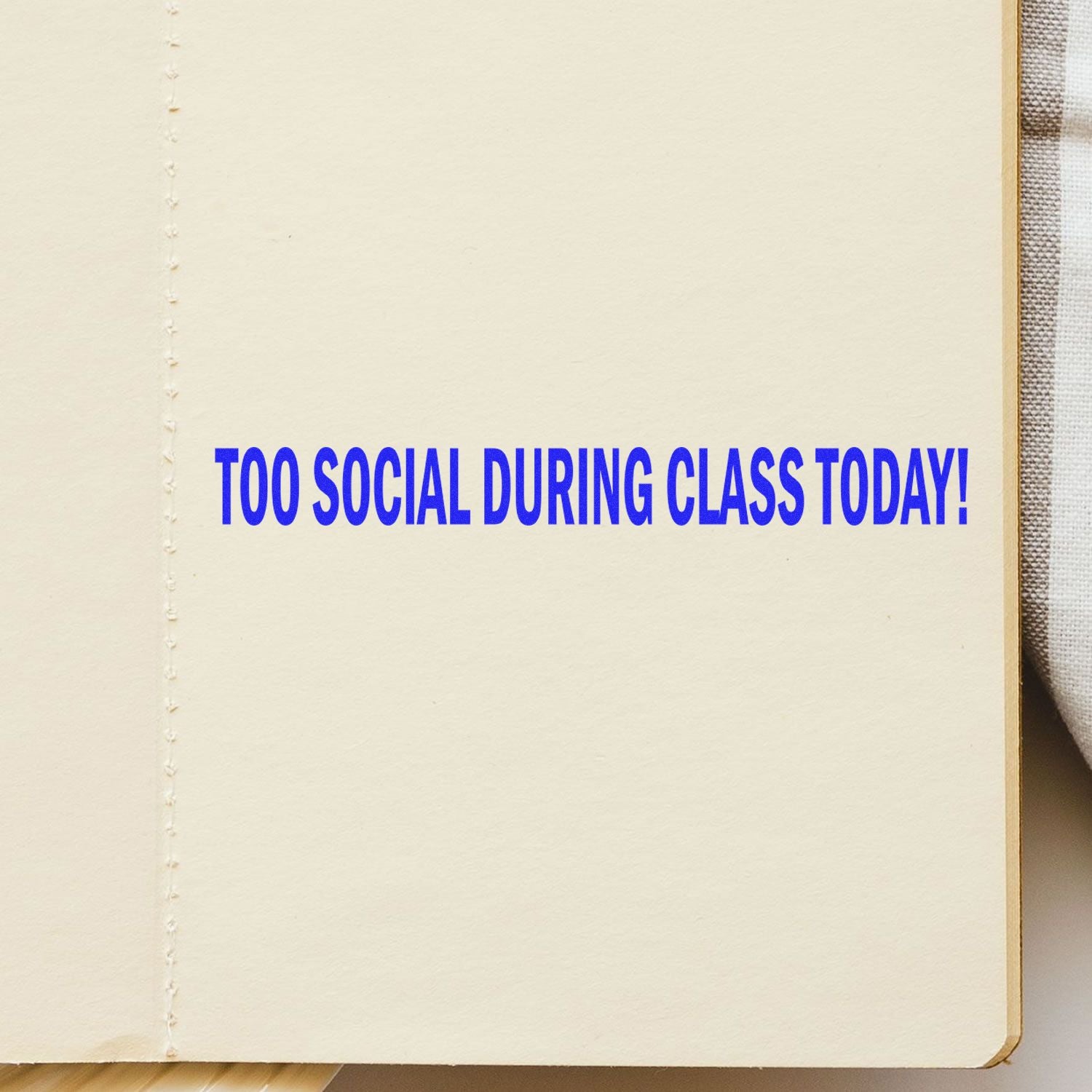 Too Social During Class Today! blue classroom warning sign on bulletin board, reminding students to stay focused.