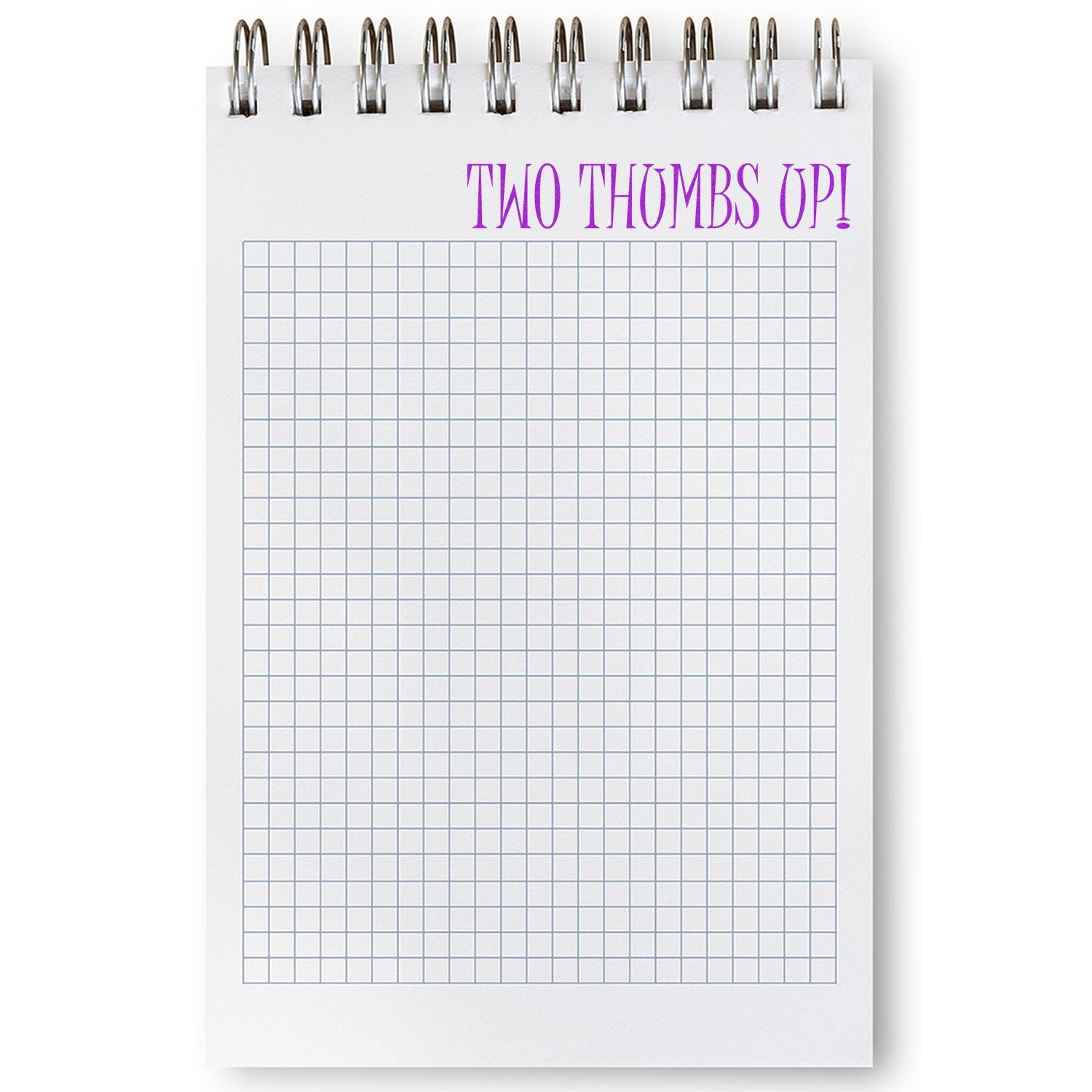 Spiral notepad with blank graph paper and Two Thumbs Up! text, white notebook mockup on a clean background.