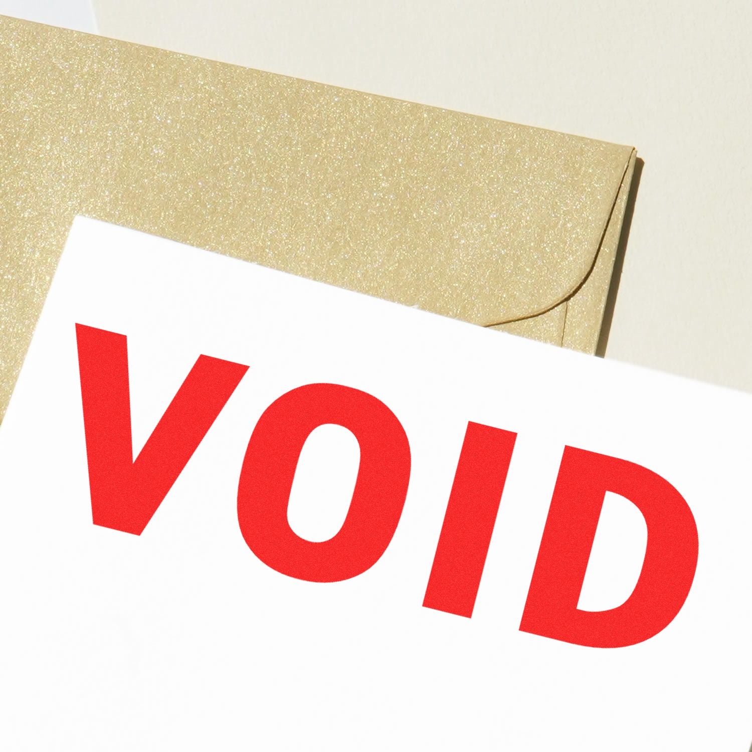 VOID tamper-evident warning label on product packaging, indicating the seal is broken and service/returns are invalid if removed.