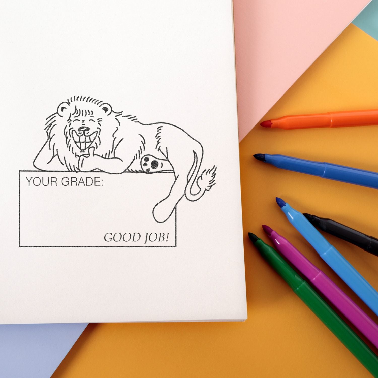 Colorful school stationery with lion coloring page and Your Grade: Good Job! notebook design.