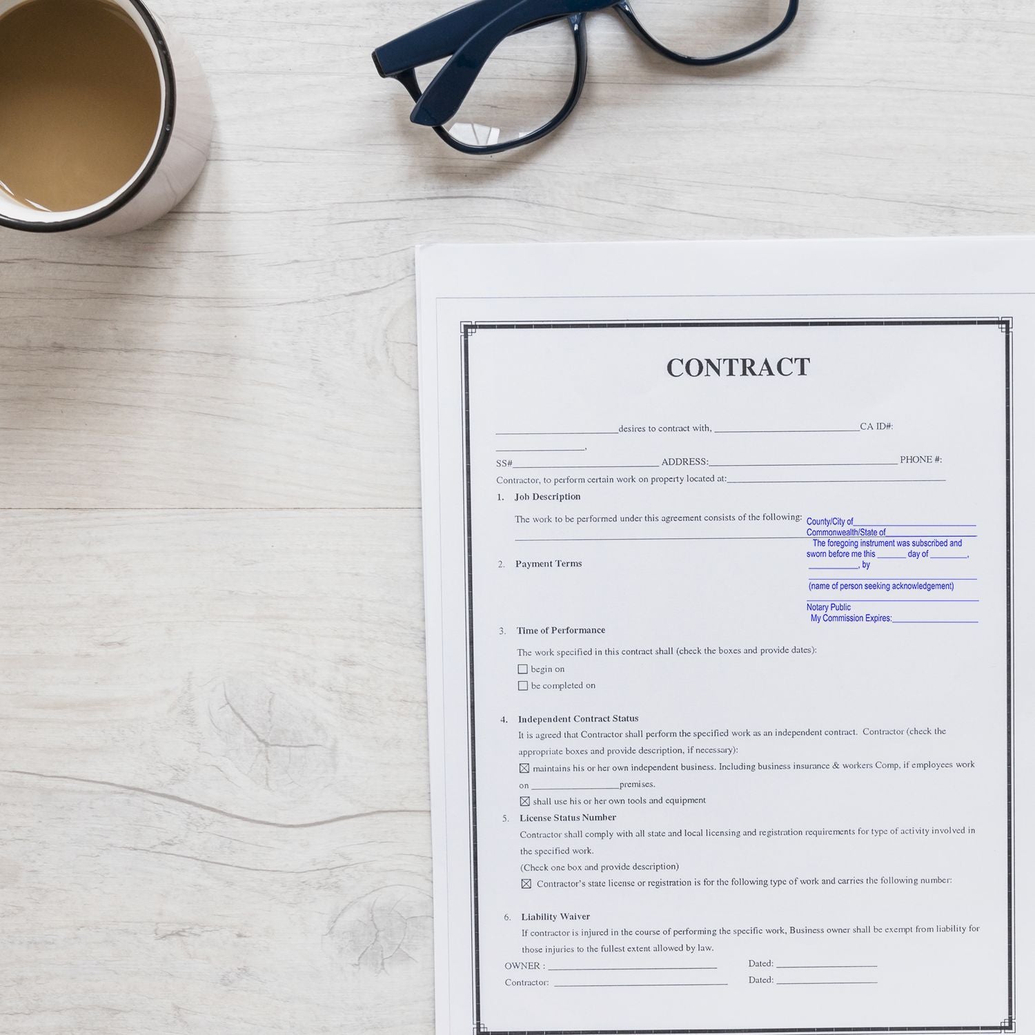 Contract document on desk with eyeglasses and coffee cup, business paperwork and legal agreement concept.