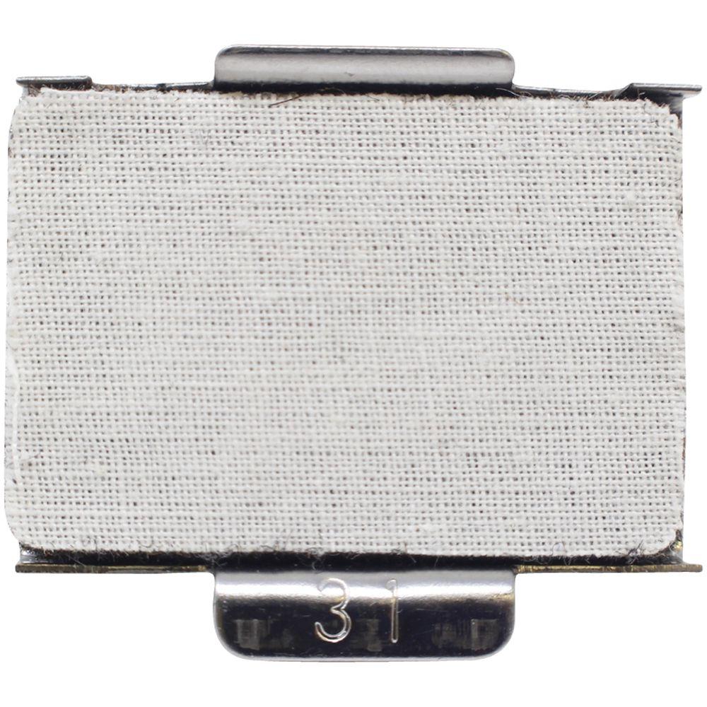 Close-up of a white woven fabric filter pad in a metal holder clip.