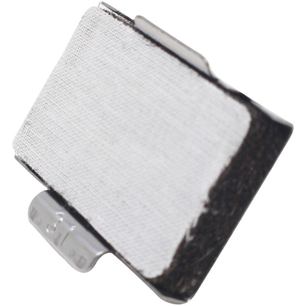 Close-up of a white woven fabric adhesive patch with a small plastic clip on a white background