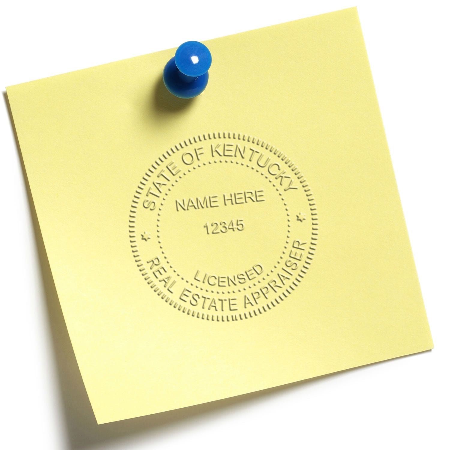 Yellow sticky note pinned with blue pushpin and State of Kentucky real estate appraiser seal.