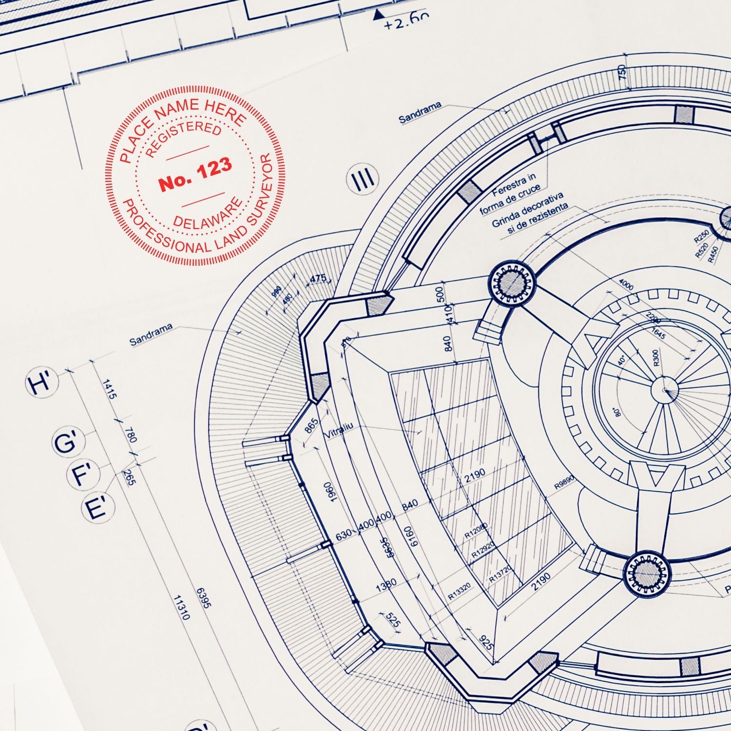 Architectural blueprint with circular floor plan and professional land surveyor stamp on technical drawing paper