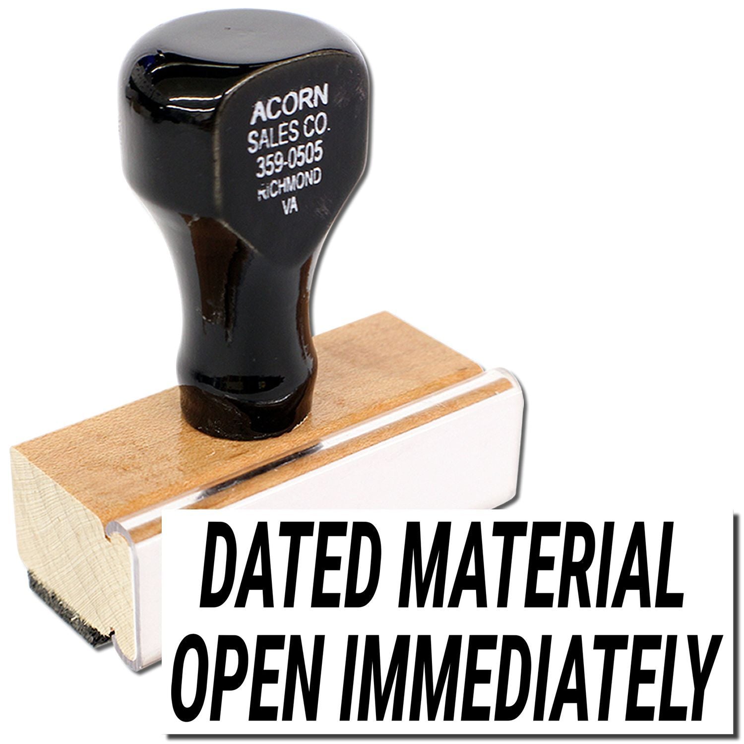 Acorn Sales Co. stamped datematerial with warning label Open Immediately, shown on a wooden shipping block.