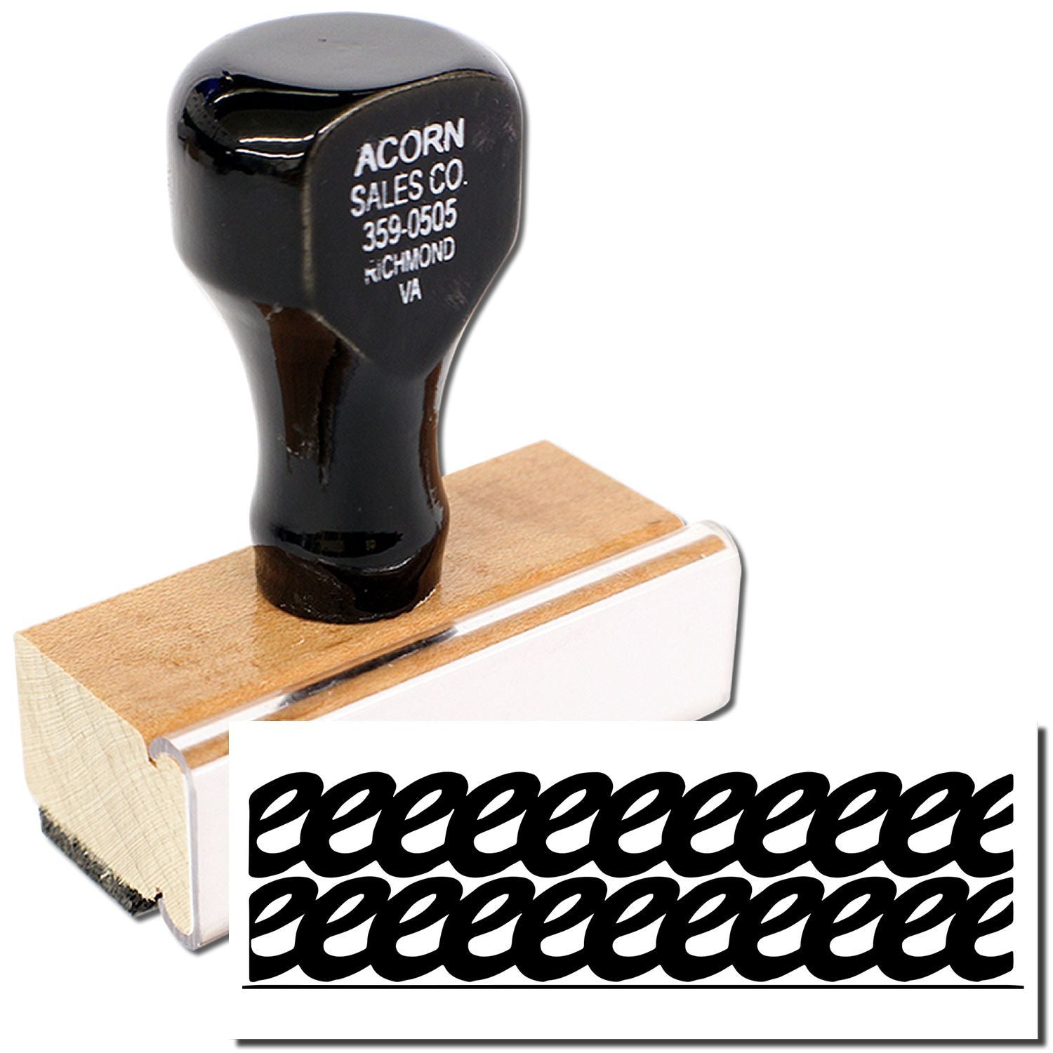 Acorn Sales Co. logo rubber stamp on wood base for labeling and branding, used daily on inventory records and shipping labels.