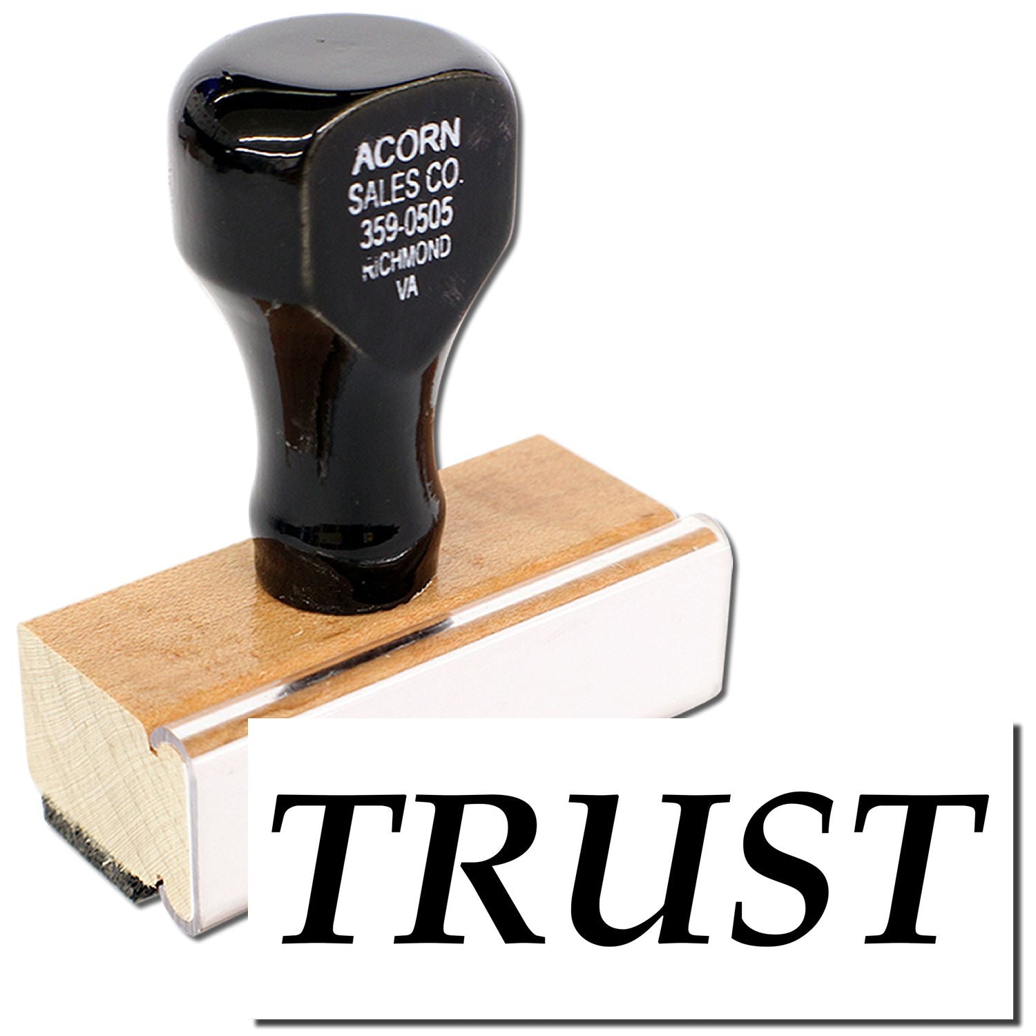 Acorn Sales Co. rubber stamp on wooden handle, showing TRUST imprint for document verification of trusted transactions.